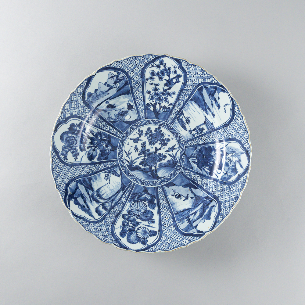 Lot1002 A blue and white 'landscape and floral' charger Qing Dynasty Kangxi  Period(1661-1722)