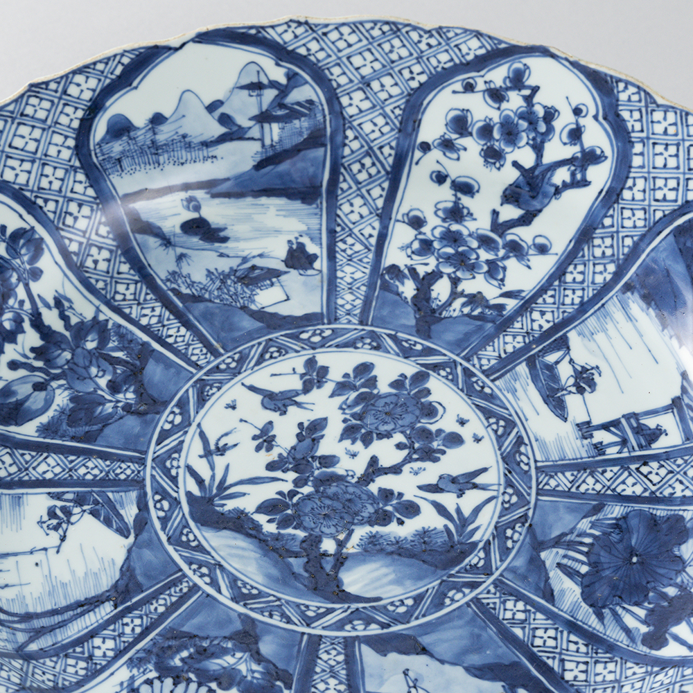 Lot1002 A blue and white 'landscape and floral' charger Qing Dynasty Kangxi  Period(1661-1722)