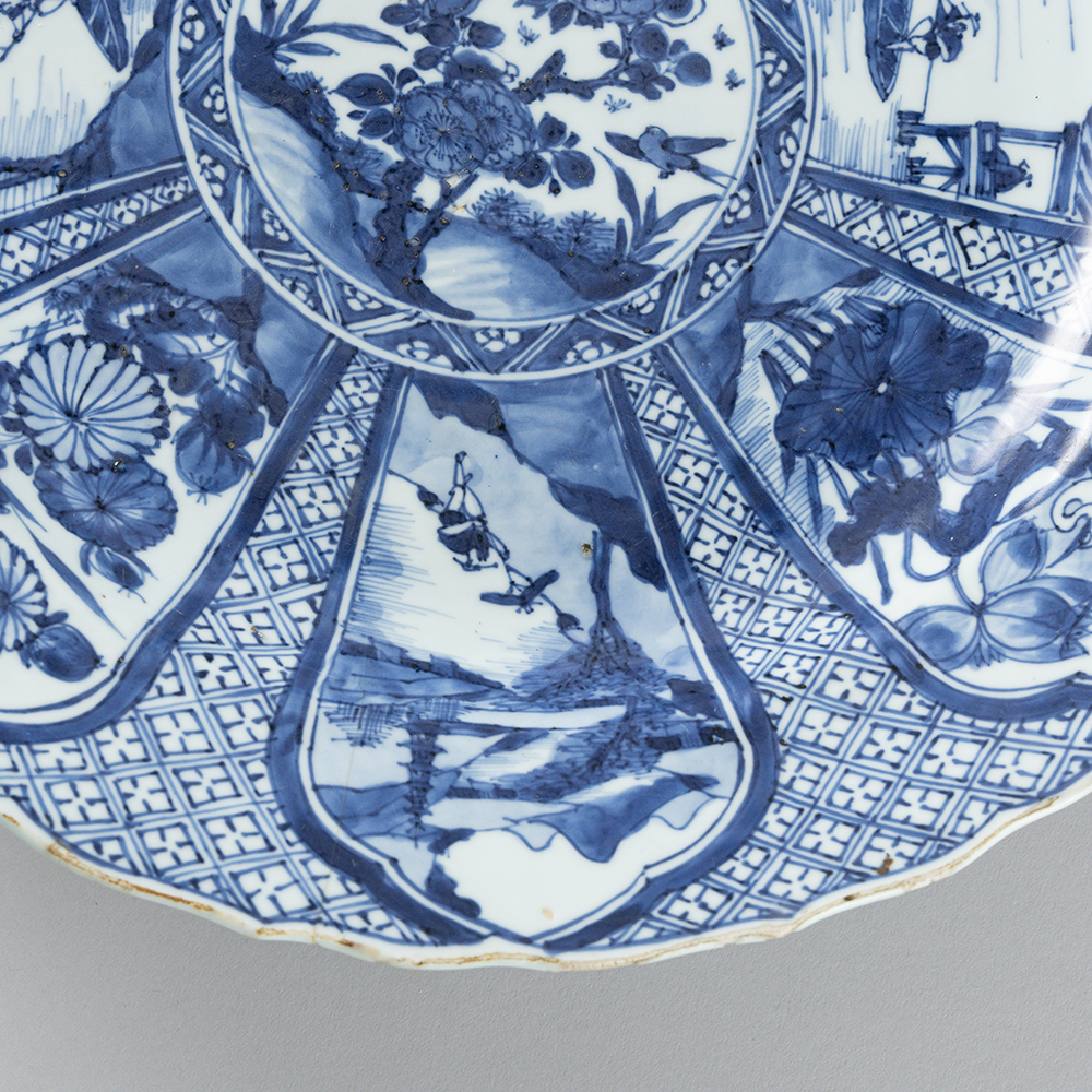 Lot1002 A blue and white 'landscape and floral' charger Qing Dynasty Kangxi  Period(1661-1722)