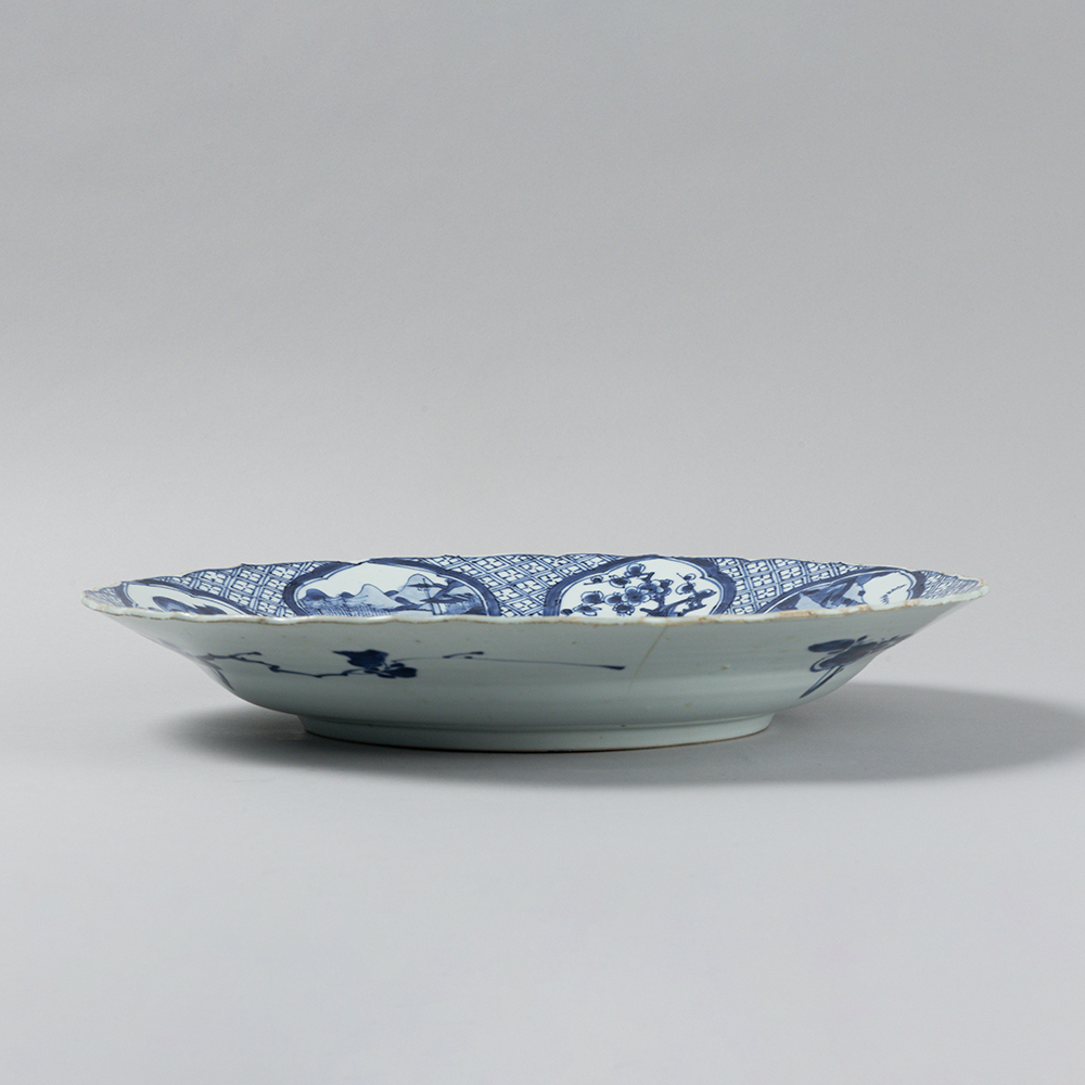 Lot1002 A blue and white 'landscape and floral' charger Qing Dynasty Kangxi  Period(1661-1722)