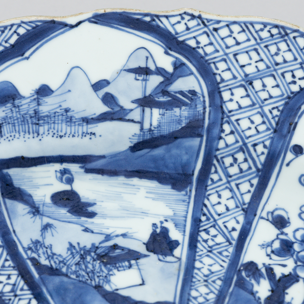 Lot1002 A blue and white 'landscape and floral' charger Qing Dynasty Kangxi  Period(1661-1722)