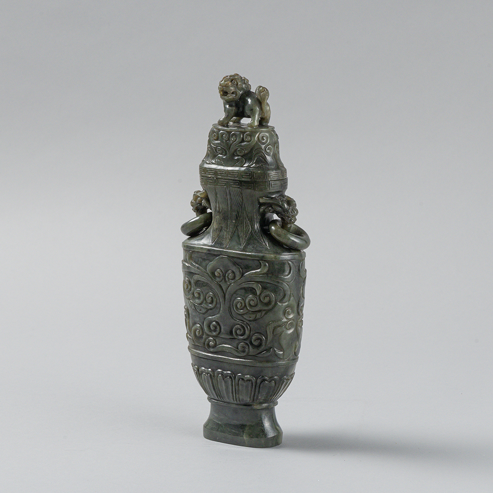 Lot2008 AN ARCHAISTIC SPINACH-GREEN JADE VASE AND COVER Late Qing to Republic (19세기말-20세기초)