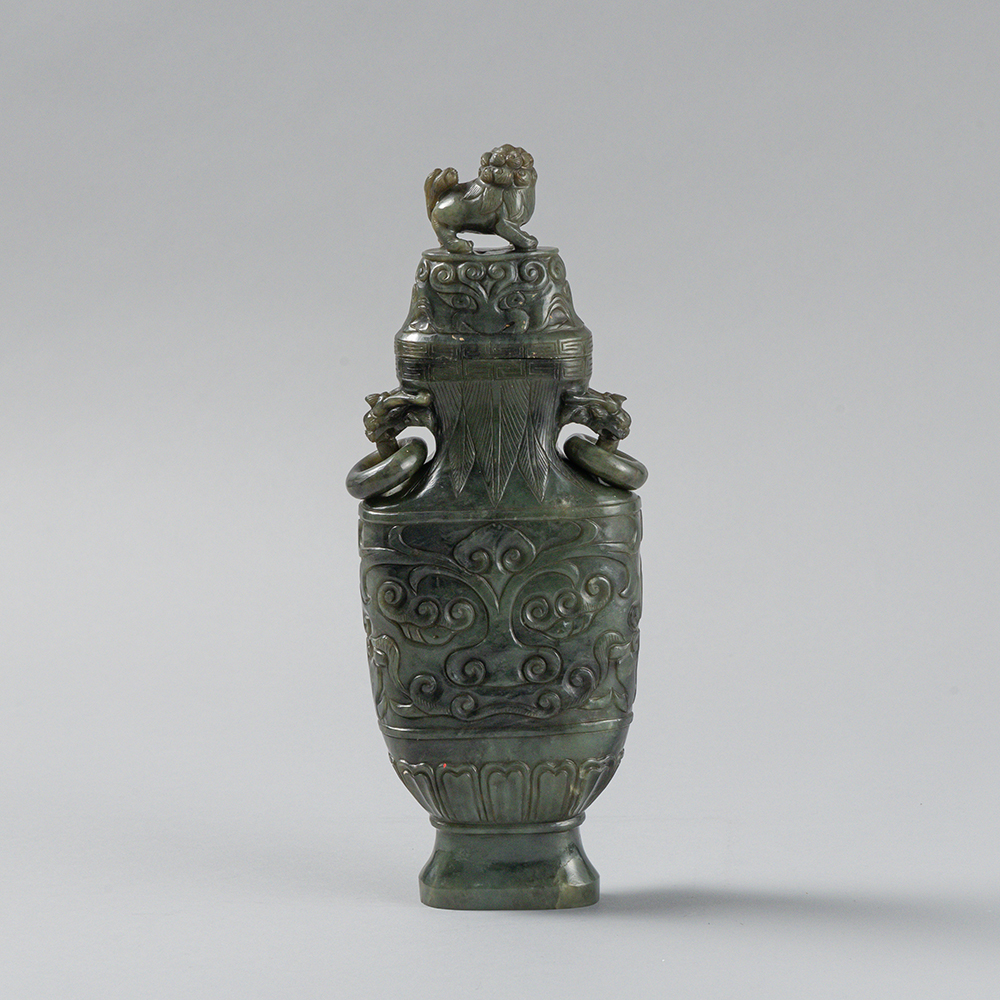 Lot2008 AN ARCHAISTIC SPINACH-GREEN JADE VASE AND COVER Late Qing to Republic (19세기말-20세기초)