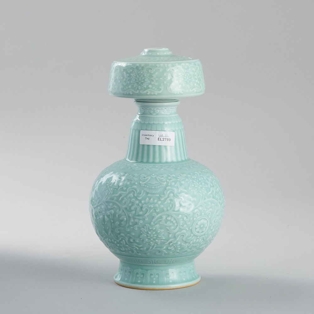 Lot1042 QING DOUQING GLAZE CARVED PORCELAIN BENBA POT Qianlong six-character mark, but later (20th century)