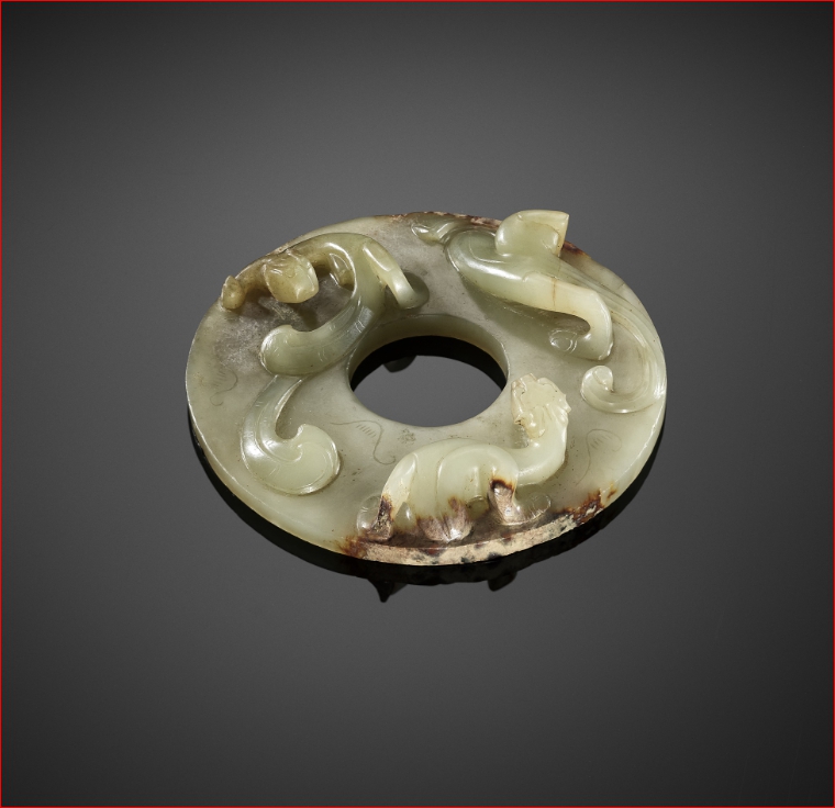 Lot2027 A CELADON JADE DISC WITH COILED DRAGONS, WESTERN HAN DYNASTY (BC 2세기-1세기 경)